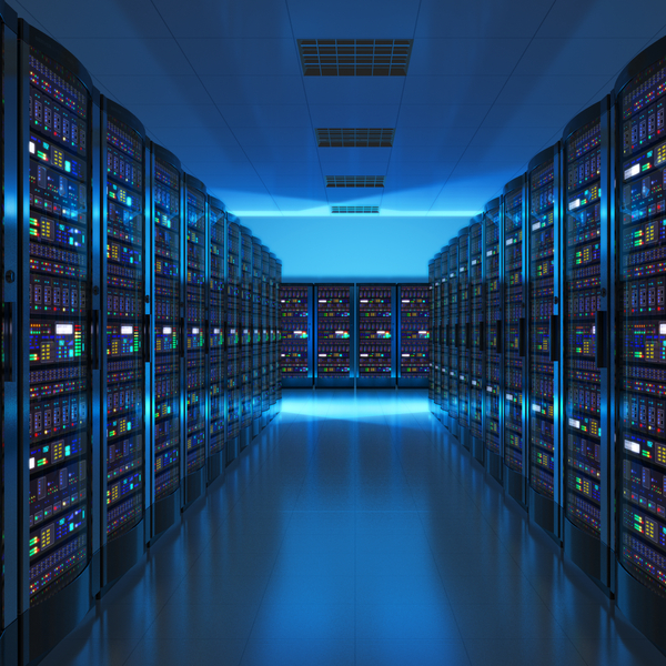 Wide angle of server room in a data center.