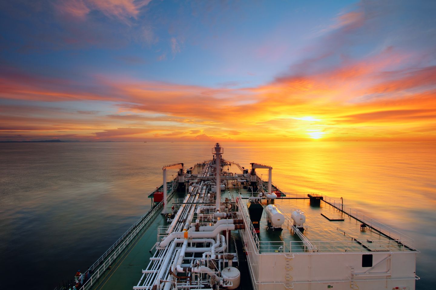 Medium angle of ocean at sunset from Liquified Natural Gas (LNG) tanker ship.