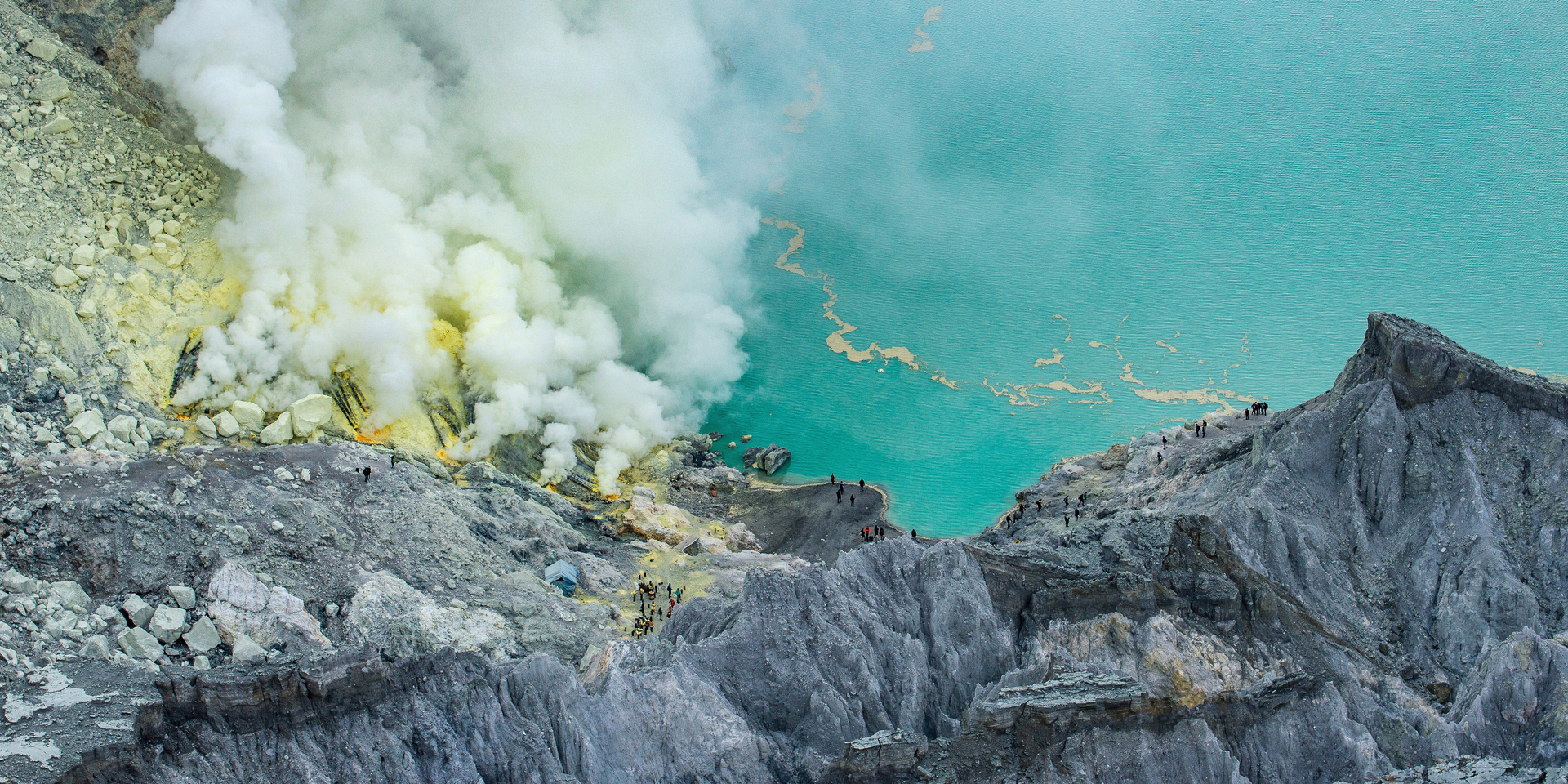 Kawah Ijen Volcano on the island of Java has sulphur vents that burn with neon blue flames and the world's largest highly acidic lake.