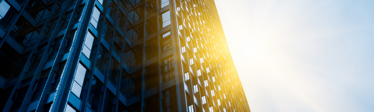Up angle of high-rise office building or skyscraper in city.