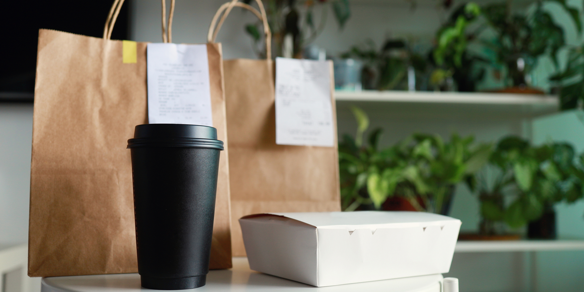Home delivery takeaway food on coffee table. Eating at home concept.