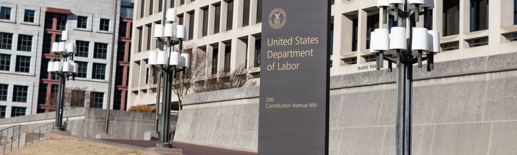 Medium angle of sign for the US Department of Labor headquarters at the Frances Perkins Building in Washington DC.