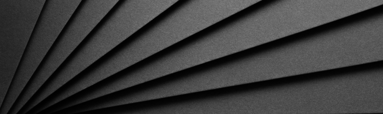 Close-up black layered paper.