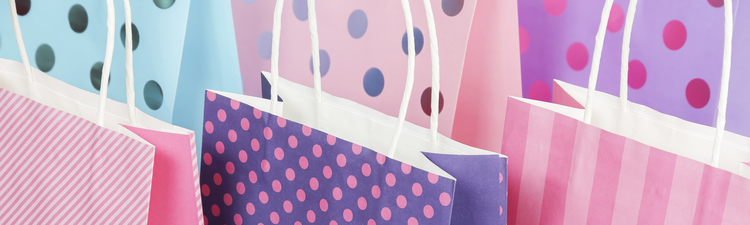 dotted and striped shopping bags close up