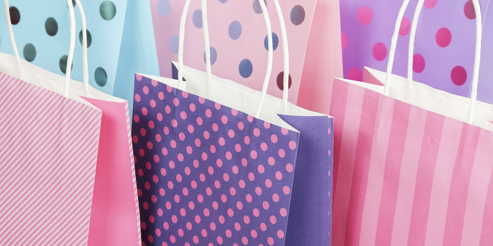 dotted and striped shopping bags close up