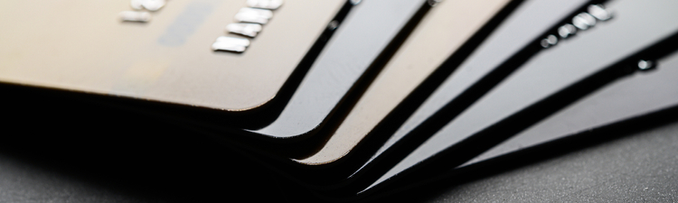 Credit cards that are stacked neatly together,selective focus