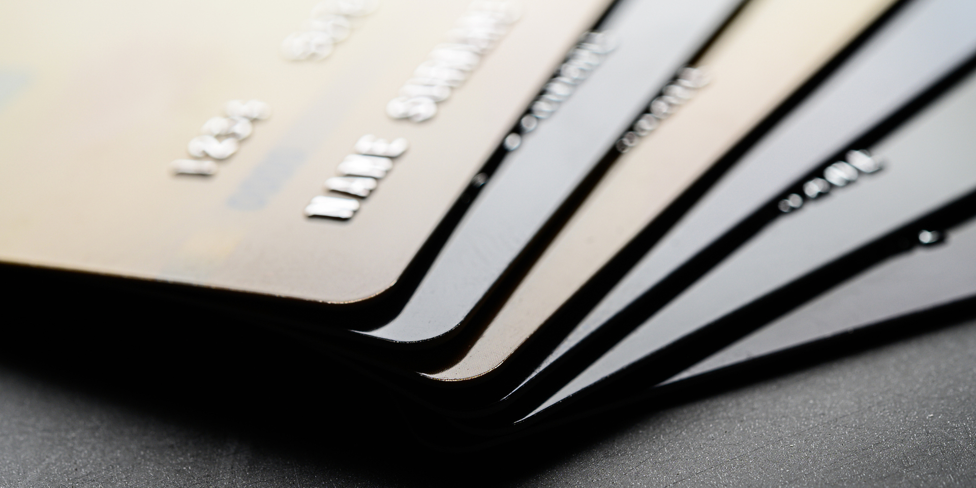 Credit cards that are stacked neatly together,selective focus