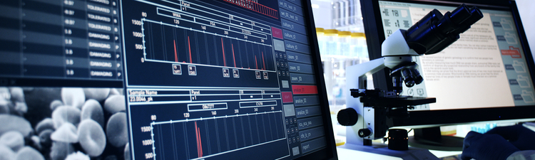 Medium angle of modern medical laboratory with computer and microscope visible.