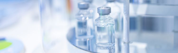 Close-up of glass vials in laboratory. 