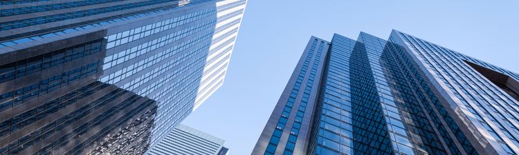 Up angle of modern skyscrapers in financial district in Toronto, Ontario, Canada.