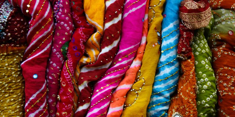 Close-up of bright, multi-colored fabrics.