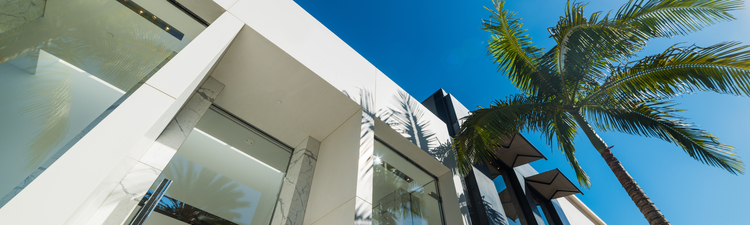Up angle of luxury retail store on Rodeo Drive in Beverly Hills, California.
