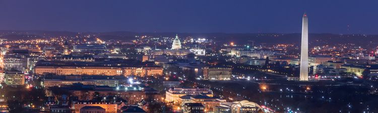 Wide angle of Washington, DC skyline at night.
