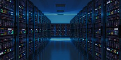 Wide angle of server room in a data center.