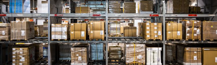 Wide angle of warehouse storage shelves.