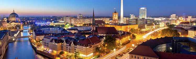 Wide angle of Berlin, Germany skyline at dusk.