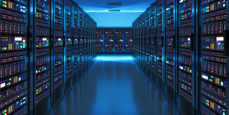 Wide angle of server room in a data center.