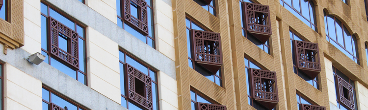 Medium angle of office building with windows in Medina, Saudi Arabia.