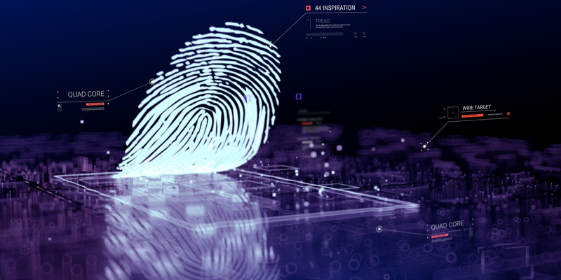 Close-up of neon fingerprint on digital touch pad.