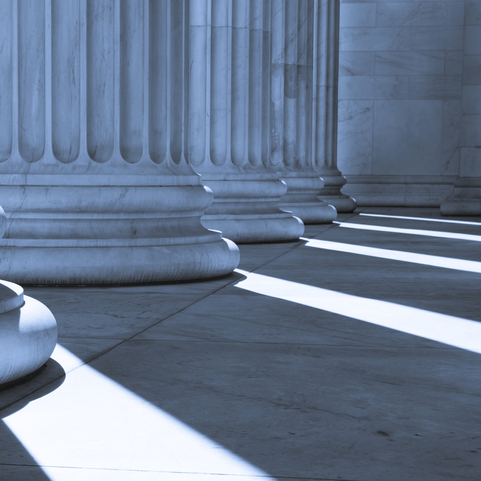 Marble Pillars Representing Legal, Financial, Strength and Stability Concepts