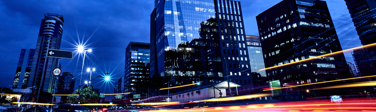 City Buildings against Blue Night Sky