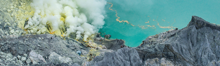 Kawah Ijen Volcano on the island of Java has sulphur vents that burn with neon blue flames and the world's largest highly acidic lake.