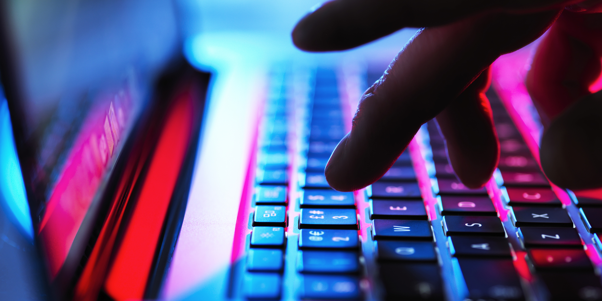 2to1 - GettyImages-1175885065_typing at his laptop computer at night