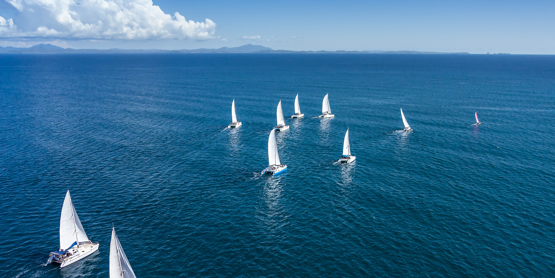 Regatta sailboat and catamaran in Mozambique Channel